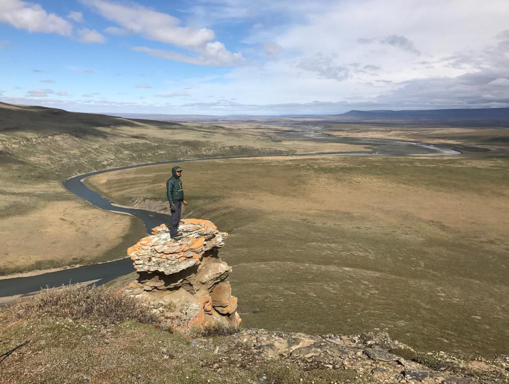 HIKER OVERLOOKING WESTERN ARCTIC