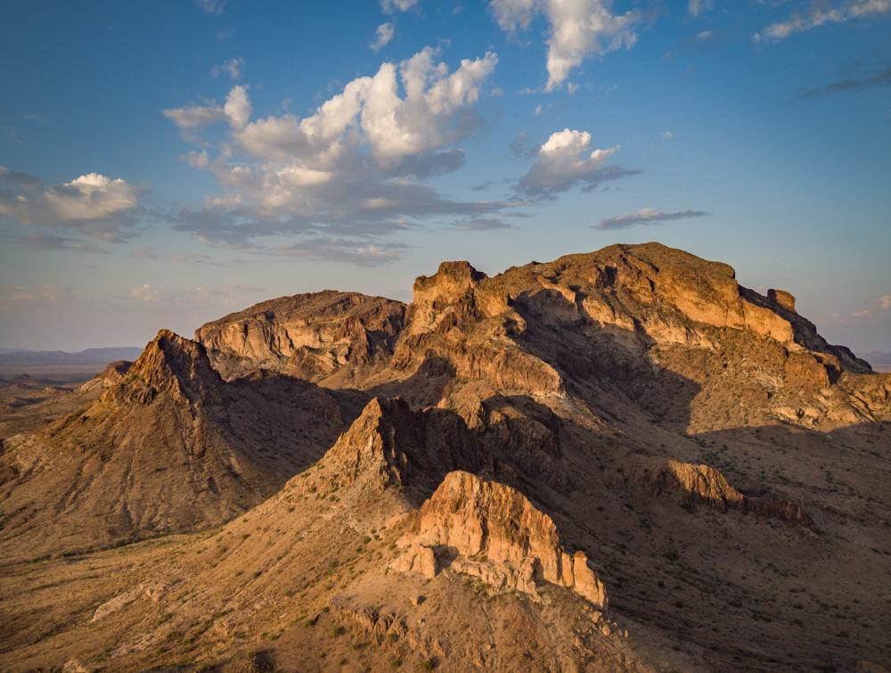 Aerial view of a colorful desert landscape.