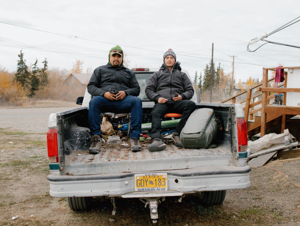 Filmmaker and Navajo activist Len Necefer, left, and Navajo activist Aaron Mike, right, visit Gwichyaa Zhee (Fort Yukon), Alaska