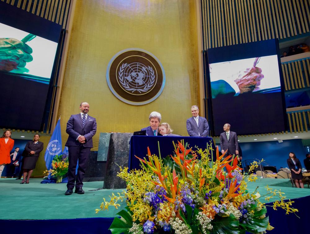 U.S. Secretary of State John Kerry signs the COP21 Climate Change Agreement on behalf of the U.S. in 2016