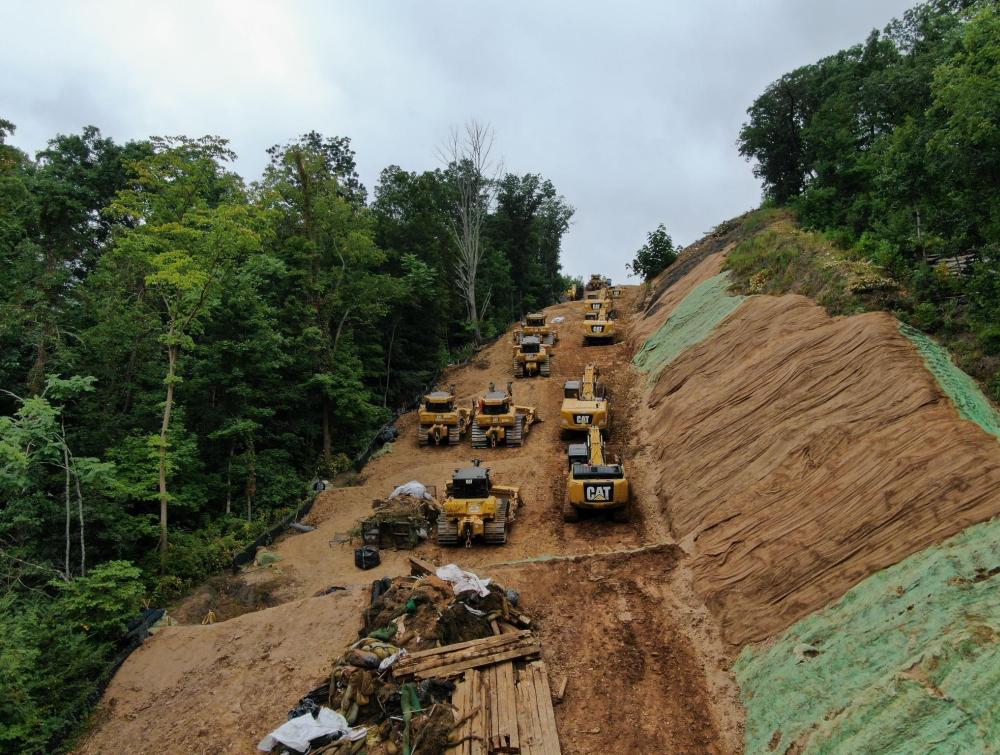 Several excavators along the pipeline route