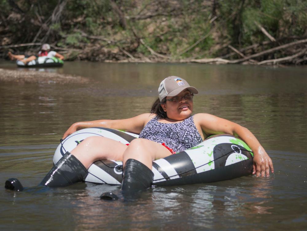 People tubing in Gila National Forest, New Mexico.