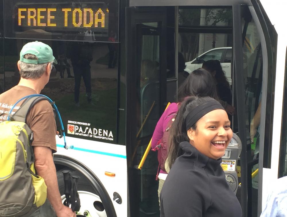 Hikers board shuttle bus to reach trailhead in Altadena, California.