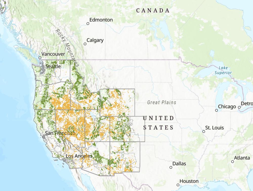 Partial map of the United States with scattered tracts highlighted in green and orange in the West
