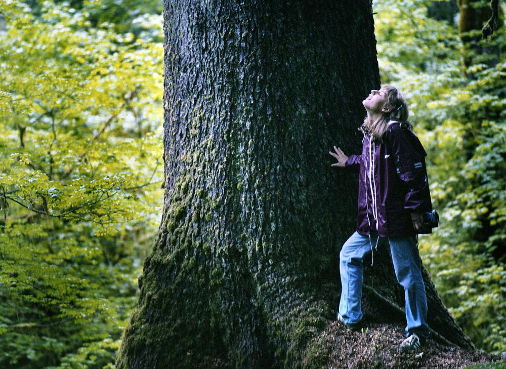 Woman in Hoh Rain Forest in Olympic National Park, Washington