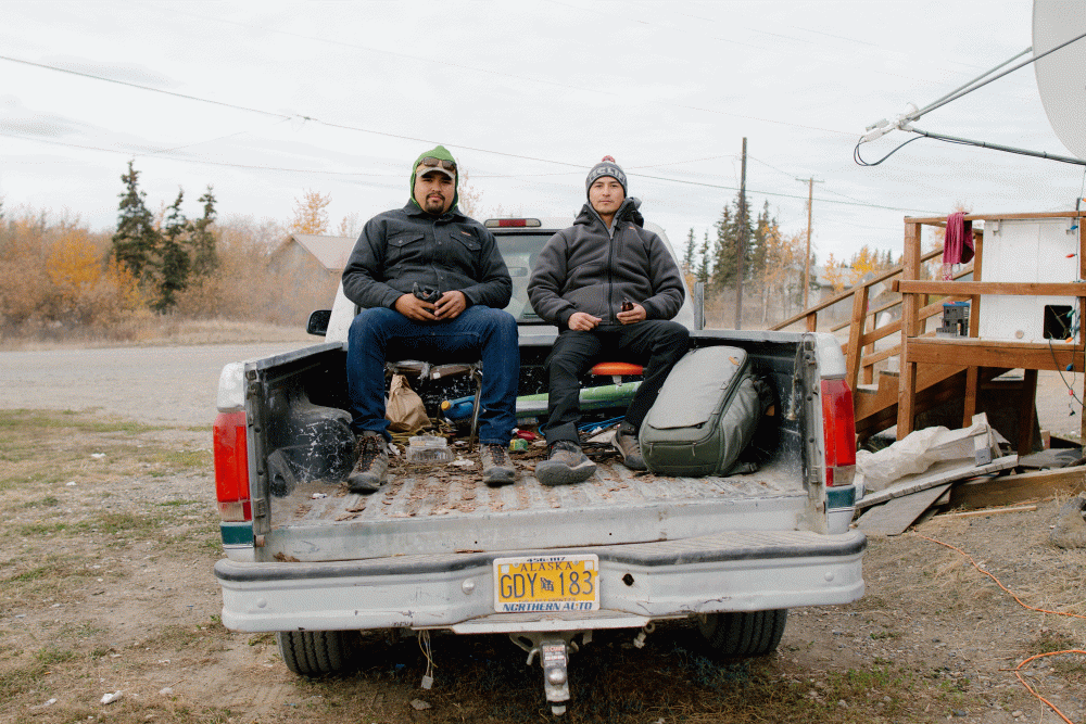 Filmmaker and Navajo activist Len Necefer, left, and Navajo activist Aaron Mike, right, visit Gwichyaa Zhee (Fort Yukon), Alaska