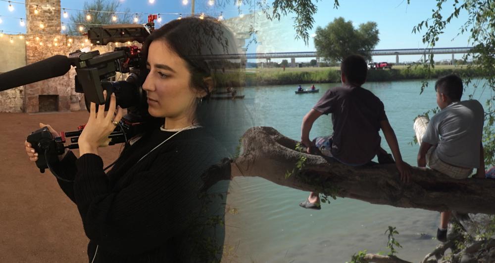 On left, dark-haired woman holding video camera. On right, children sitting on tree limb and looking out over body of water, viewed from behind