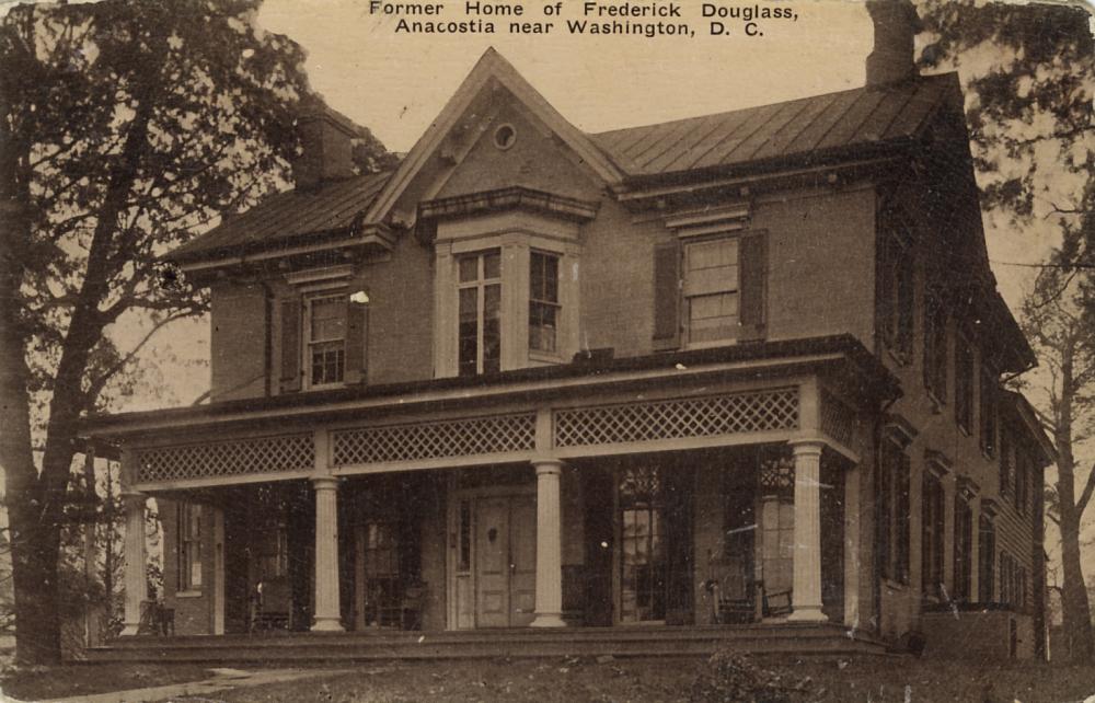 Old, sepia tone photo of a large house labeled "Former Home of Frederick Douglass. Anacostia near Washington, D.C."