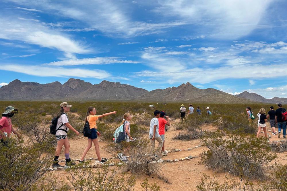 students hiking during field trip