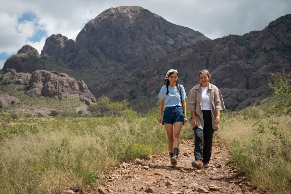 Two women hiking at Organ Mountains-Desert Peaks National Monument in New Mexico