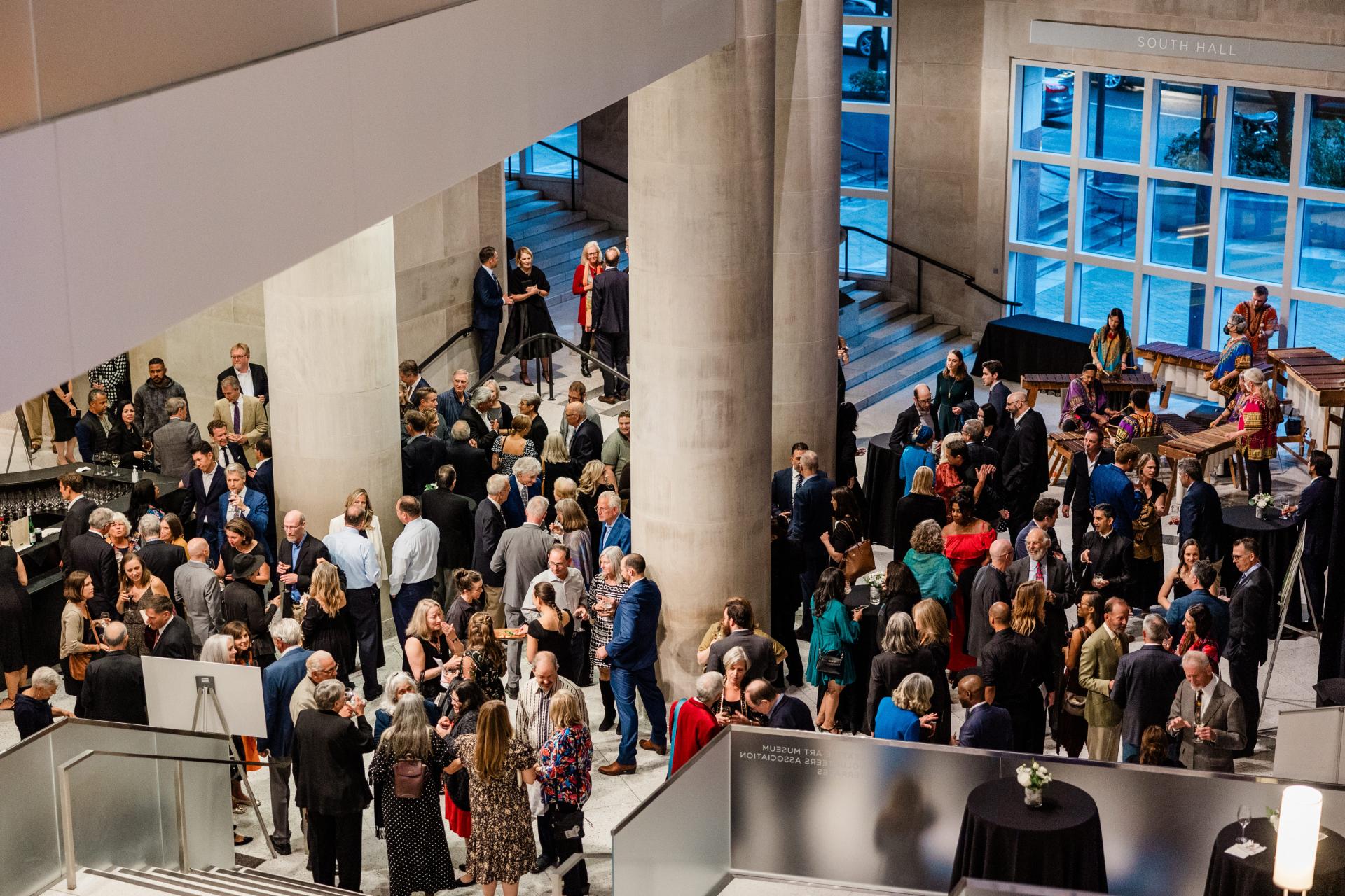 people gathering at a cocktail reception