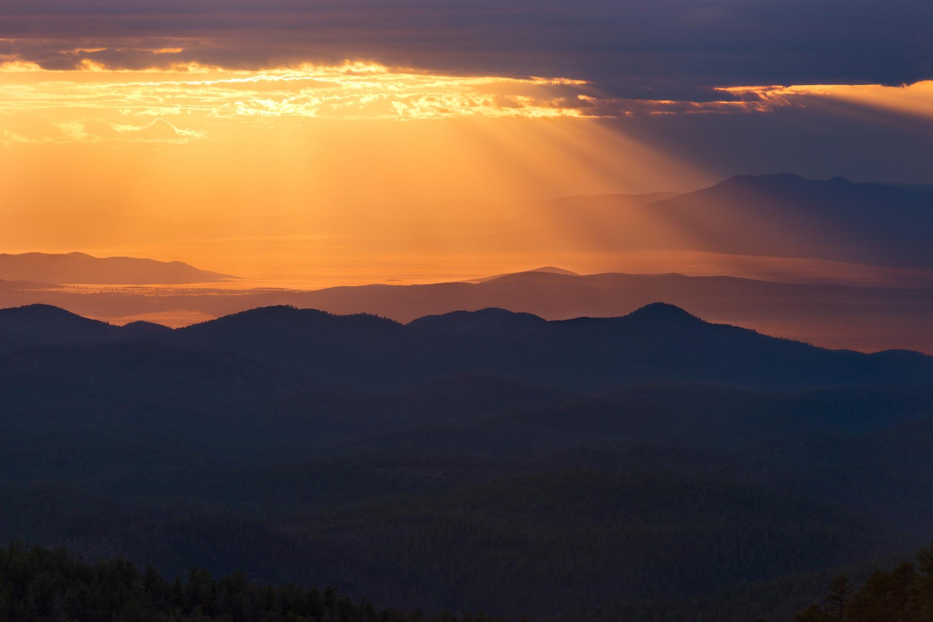 Light rays over Cibola National Forest, New Mexico.