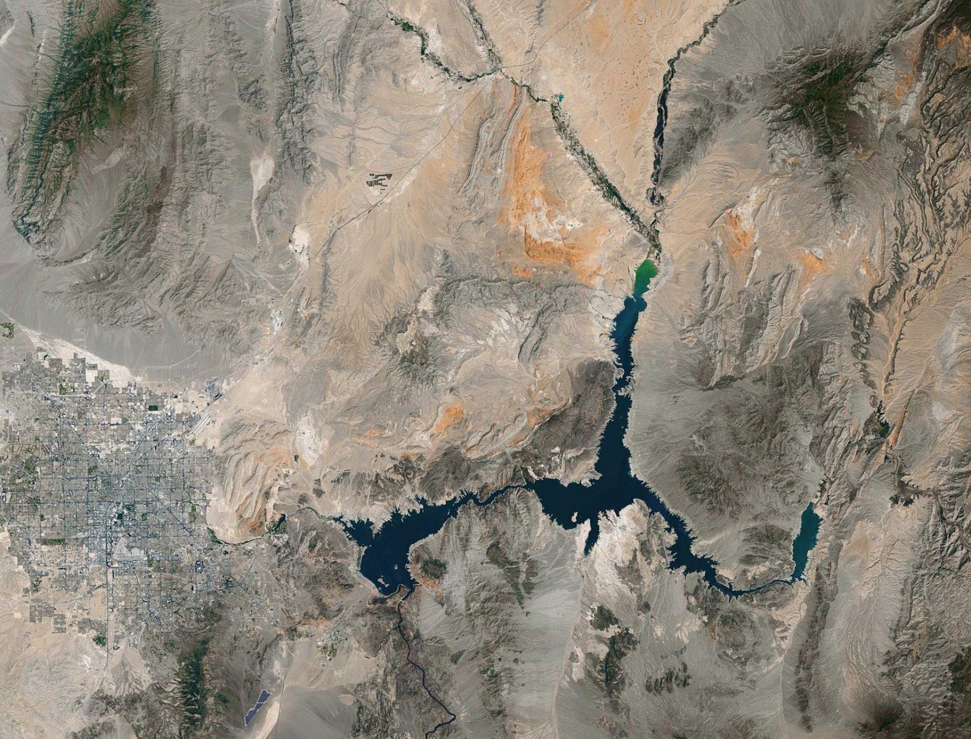 Aerial view of Lake Mead (dark blue jagged shapes) and surrounding landscape from May 23, 2016