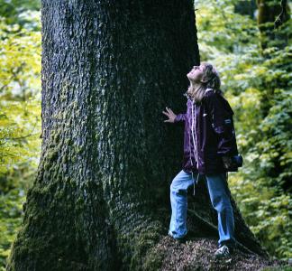 Woman in Hoh Rain Forest in Olympic National Park, Washington