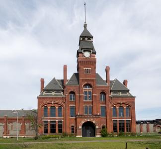 Red-brick building with central spire at Pullman National Monument, Illinois
