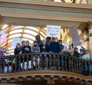 Local citizens protest against terminations and attacks on public lands at a rally in Helena, Montana.