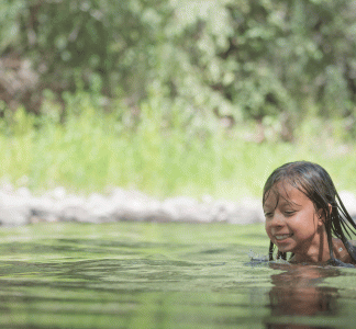 Girl swimming in the Mogollon Box unit of the Gila Proposed Wilderness and Wild & Scenic Rivers.