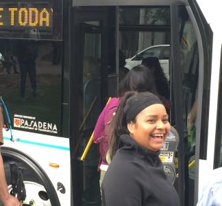 Hikers board shuttle bus to reach trailhead in Altadena, California.