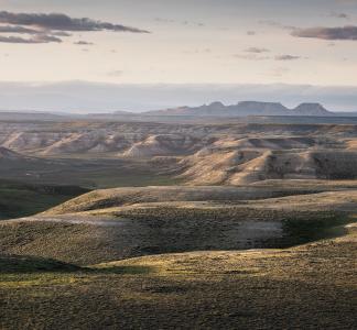 Rolling hills and rocky buttes in the Northern Red Desert, Wyoming