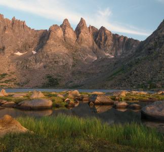 Mountains, lake and green grass in Bridger Wilderness, Wyoming