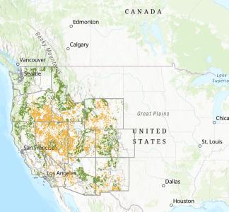 Partial map of the United States with scattered tracts highlighted in green and orange in the West