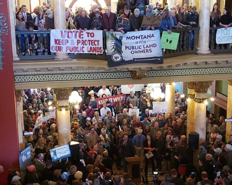 Public lands supporters rally at the state capitol rotunda in Helena, Montana. 